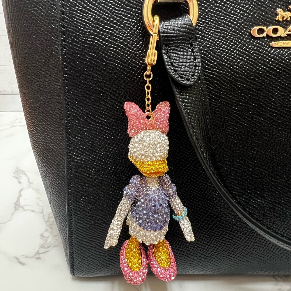BaubleBar Disney Daisy Duck Bag Charm